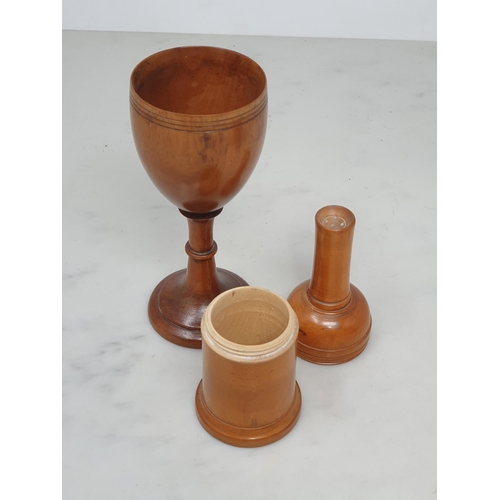 538 - A collection of assorted treen Containers including a boxwood Glove Powderer, a treen domed top Sift... 