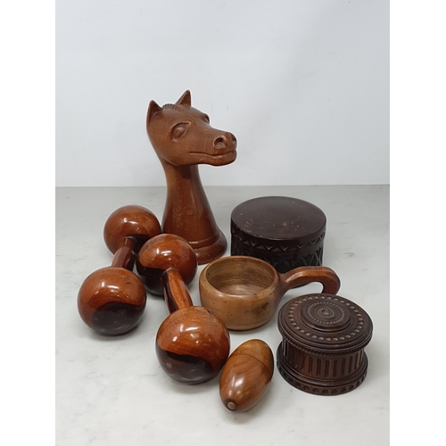 542 - A collection of treen including a pair of turned lignum vitae Dumbbells, a circular treen lidded Box... 