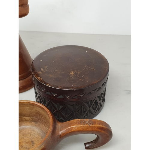 542 - A collection of treen including a pair of turned lignum vitae Dumbbells, a circular treen lidded Box... 