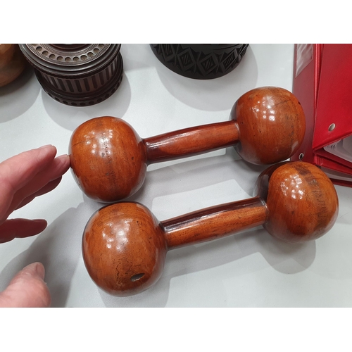 542 - A collection of treen including a pair of turned lignum vitae Dumbbells, a circular treen lidded Box... 