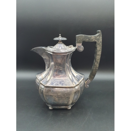 61 - A George V silver Hot Water Jug of panelled form on ball feet, Sheffield 1927, 650gms all in