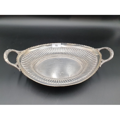 72 - An Edward VII silver two handled fluted oval bowl with presentation inscription, Sheffield 1903, 13i... 