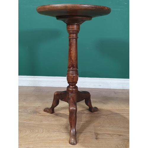 742 - A 19th Century mahogany Manx tripod Table with dish top and turned stem, 14in D