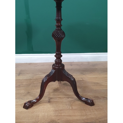 764 - A Georgian mahogany Table, the shaped top with six dished sections, carved leafage and rosette desig... 