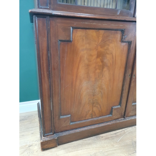 765 - A 19th Century mahogany Glazed Bookcase, the moulded cornice, above pair of glazed doors enclosing t... 