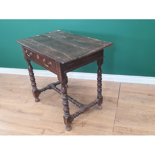 768 - A late 17th Century oak Side Table with three plank top above single frieze drawer with later handle... 