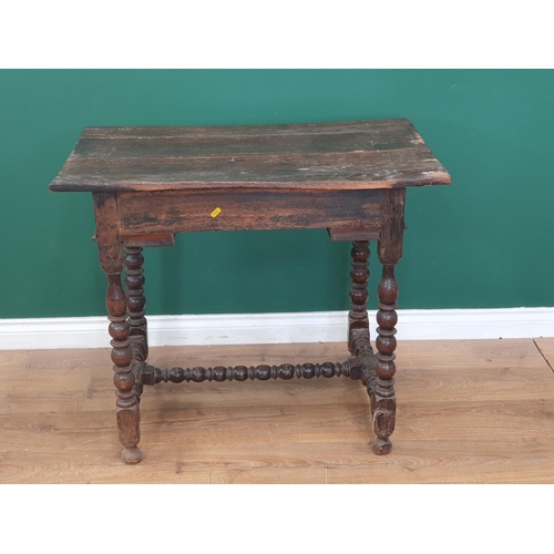 768 - A late 17th Century oak Side Table with three plank top above single frieze drawer with later handle... 