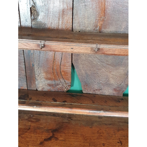 769 - An 18th Century oak Cardiganshire Dresser and Rack, the rack with two shelves having blacksmith forg... 