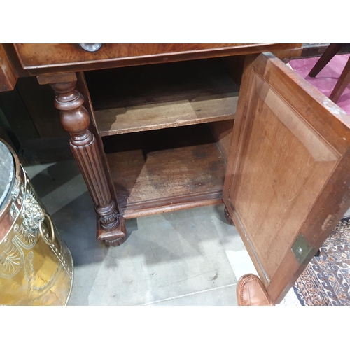 773 - A William IV mahogany Breakfront Pedestal Sideboard, fitted three drawers above two cupboards flanke... 