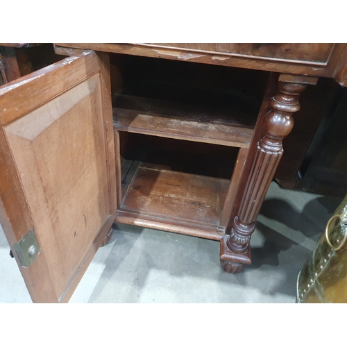 773 - A William IV mahogany Breakfront Pedestal Sideboard, fitted three drawers above two cupboards flanke... 