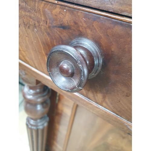 773 - A William IV mahogany Breakfront Pedestal Sideboard, fitted three drawers above two cupboards flanke... 