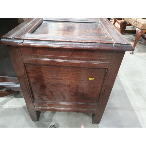 776 - A 17th Century oak West Country Coffer with sunken three panel lid above arcaded leafage shallow car... 