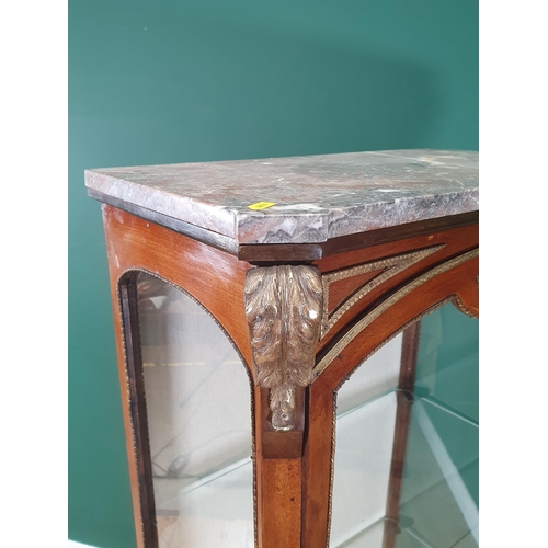 782 - A 19th Century walnut and ormolu Display Cabinet, the marble top above a single glazed door, glazed ... 