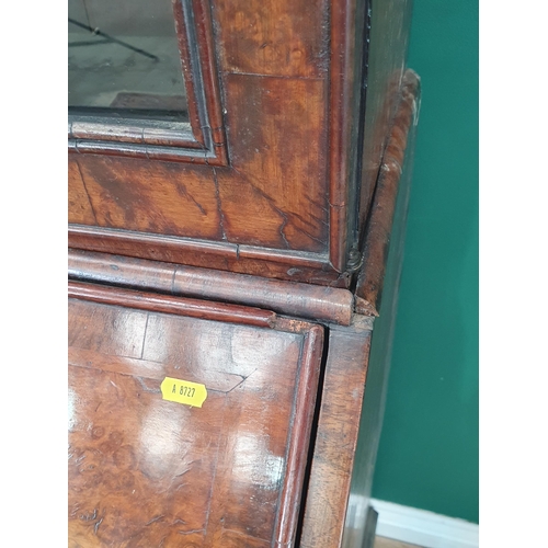 792 - An antique Queen Anne style walnut Bureau Bookcase, the single glazed door above the fall front encl... 