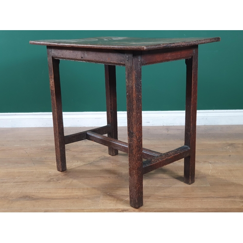 795 - An antique oak Side Table the three plank top raised on chamfered supports united by H stretcher, 2f... 