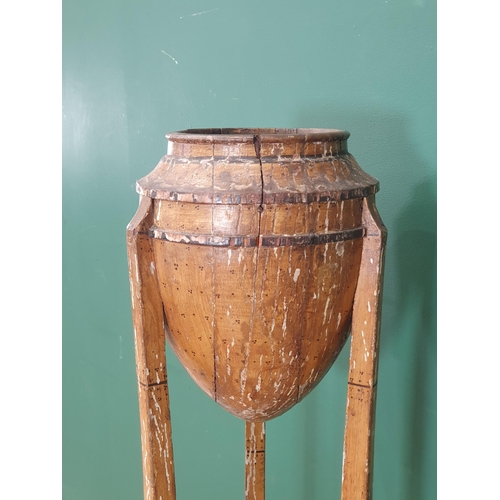 796 - A 19th Century painted faux bamboo two tier Plant Stand the top in the form of an Acorn, raised on s... 