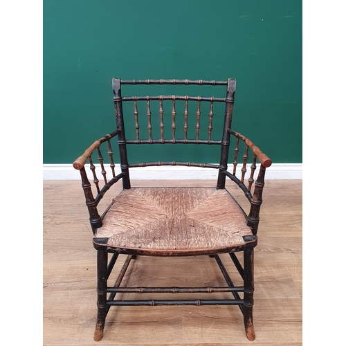 799 - A 19th Century Sussex Type painted faux bamboo Elbow Chair with rush seat. (R2)