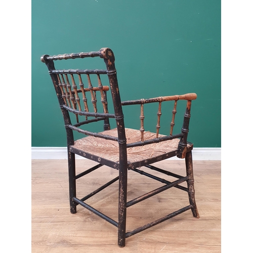 799 - A 19th Century Sussex Type painted faux bamboo Elbow Chair with rush seat. (R2)