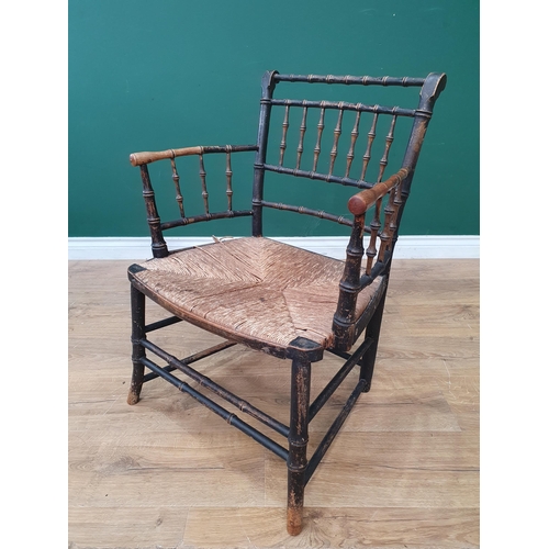 799 - A 19th Century Sussex Type painted faux bamboo Elbow Chair with rush seat. (R2)