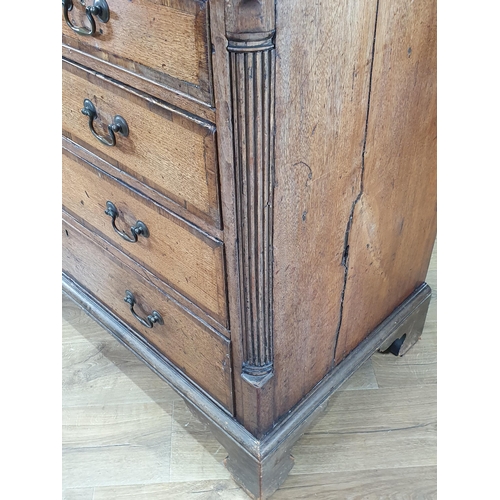 804 - A Georgian oak Chest of two short, three long graduated Drawers, with moulded cornice above floral f... 