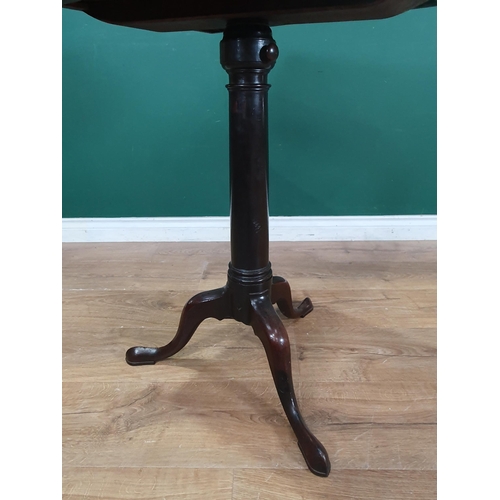 806 - A 19th Century mahogany Reading Table with adjustable top and fitted drawer, the turned column havin... 