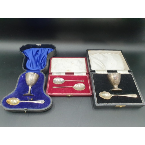 81 - A pair of Elizabeth II silver seal top Spoons, Sheffield 1973, and two Egg Cups and Spoons, Sheffiel... 