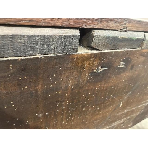 813 - An 18th Century oak Dresser Base with moulded top above three drawers and a shaped frieze on cabriol... 