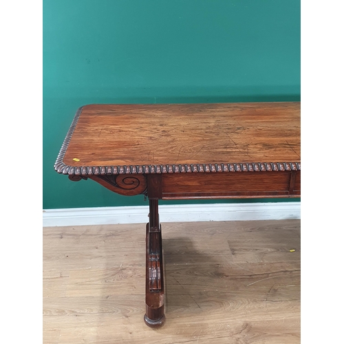 816 - A Regency rosewood Library Table with moulded edge, fitted two frieze drawers on cheval base, 5ft 3i... 