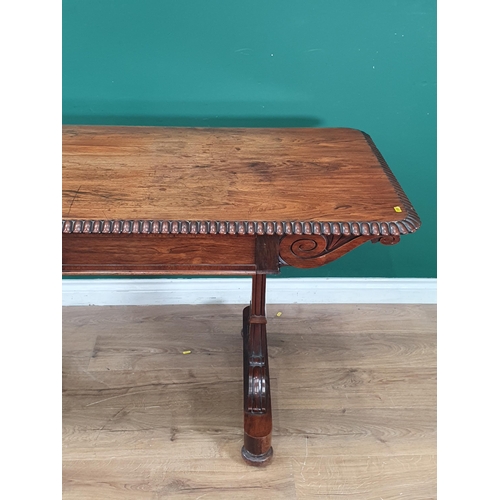 816 - A Regency rosewood Library Table with moulded edge, fitted two frieze drawers on cheval base, 5ft 3i... 