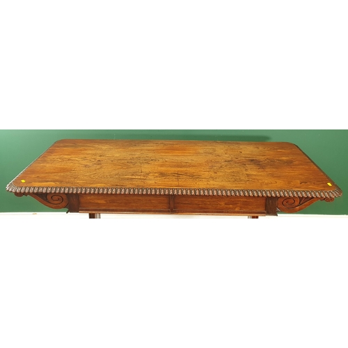 816 - A Regency rosewood Library Table with moulded edge, fitted two frieze drawers on cheval base, 5ft 3i... 