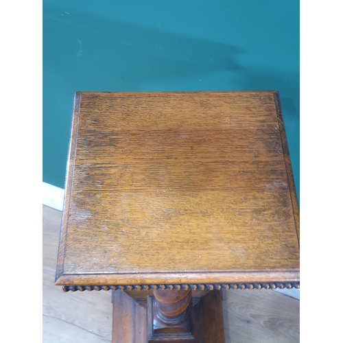 824 - An antique oak Jardinere Stand on barley twist column and square base with bracket feet 2ft 9in H x ... 