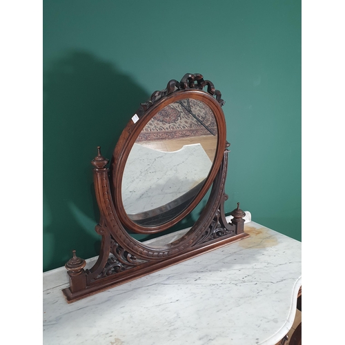 832 - A Victorian walnut and marble top Dressing Table with oval mirror above the serpentine marble top, f... 