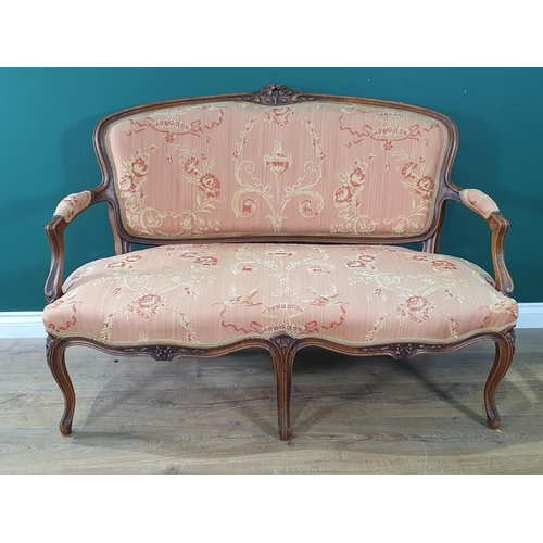 836 - A walnut framed French style three piece Suite having carved floral design top rails with pink flora... 