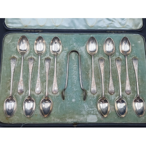 84 - One dozen Edward VII silver Coffee Spoons and Sugar Tongs with engraved decoration, Sheffield 1902, ... 