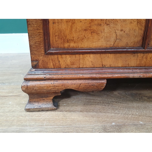 844 - A Gothic oak Bookcase with moulded cornice above a pair of astragal glazed doors enclosing adjustabl... 