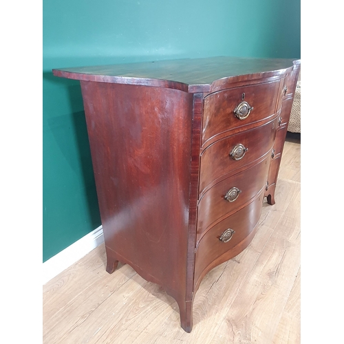 845 - A George III mahogany serpentine Chest of Drawers fitted with two short and two long drawers above a... 