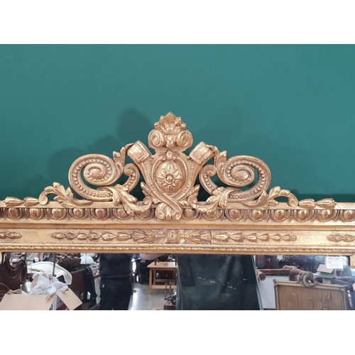 846 - A 19th Century gilt Overmantel Mirror, the pierced crest above a rectangular plate in a moulded fram... 