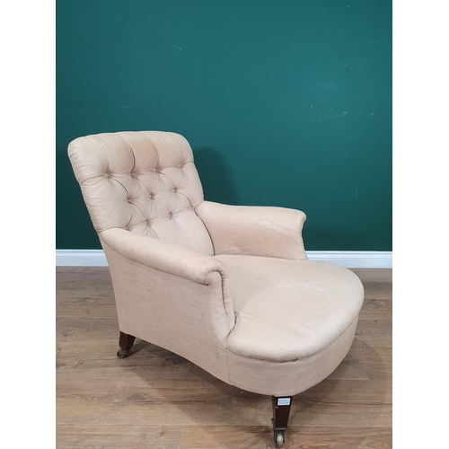 850 - A Howard and Sons deep seated button back upholstered Armchair, with square tapered front supports a... 