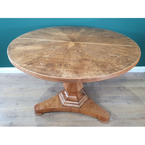 863 - A 19th Century Continental walnut circular Table and six Chairs, the segmented table top supported o... 