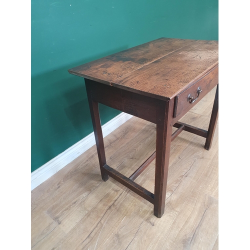 865 - An 18th Century oak Side Table fitted frieze drawer and raised on moulded and chamfered squared supp... 