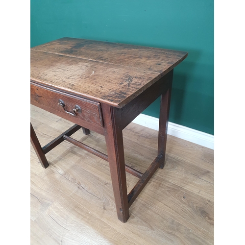 865 - An 18th Century oak Side Table fitted frieze drawer and raised on moulded and chamfered squared supp... 