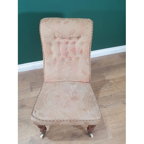 867 - A Victorian upholstered button back Slipper Chair with floral decoration, raised on turned walnut fr... 