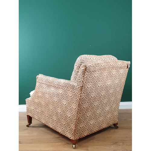 878 - A Howard and Sons Armchair in 'H & S' monogrammed ticking, raised on square tapered supports and cas... 