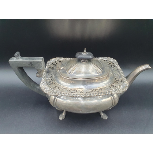 88 - A George V silver three piece Tea Service of boat shape with gadroon and pierced rims raised on shap... 