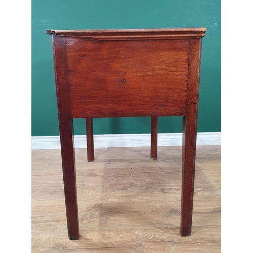 889 - A Georgian mahogany Lowboy fitted three drawers around a shaped frieze on chamfered squared supports... 