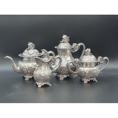 89 - A 19th century fine quality Chinese silver four piece Tea and Coffee Service exquisitely decorated n... 