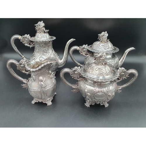 89 - A 19th century fine quality Chinese silver four piece Tea and Coffee Service exquisitely decorated n... 