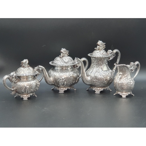 89 - A 19th century fine quality Chinese silver four piece Tea and Coffee Service exquisitely decorated n... 