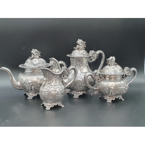 89 - A 19th century fine quality Chinese silver four piece Tea and Coffee Service exquisitely decorated n... 