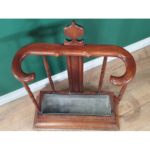 890 - A Victorian Stick/Umbrella Stand with turned supports and including a drip pan, 2ft 11in H (R6)